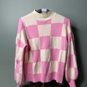 Stylish Pink and White Checkered Turtleneck Sweater